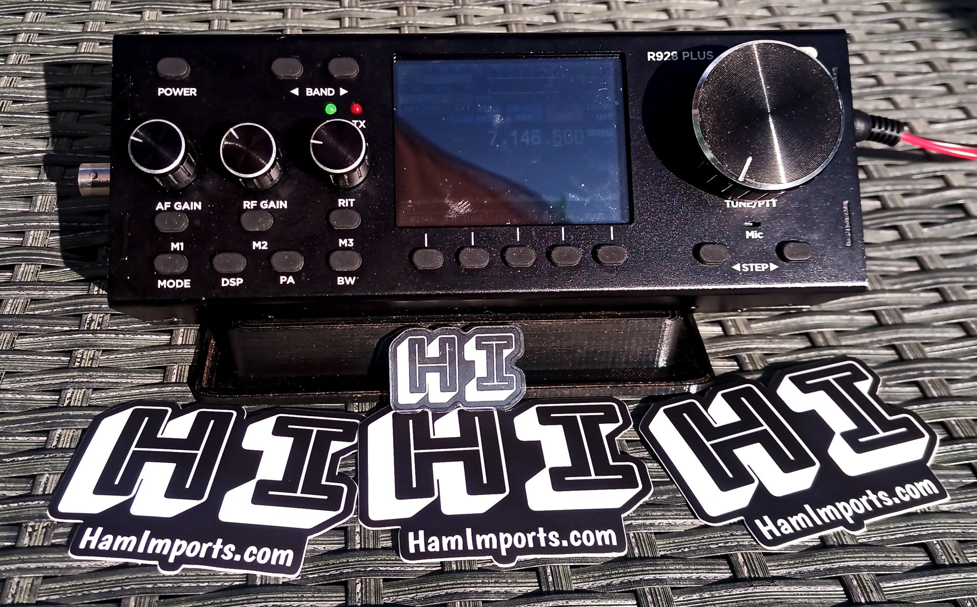 Ham Imports badge and stickers with an RS-928 radio