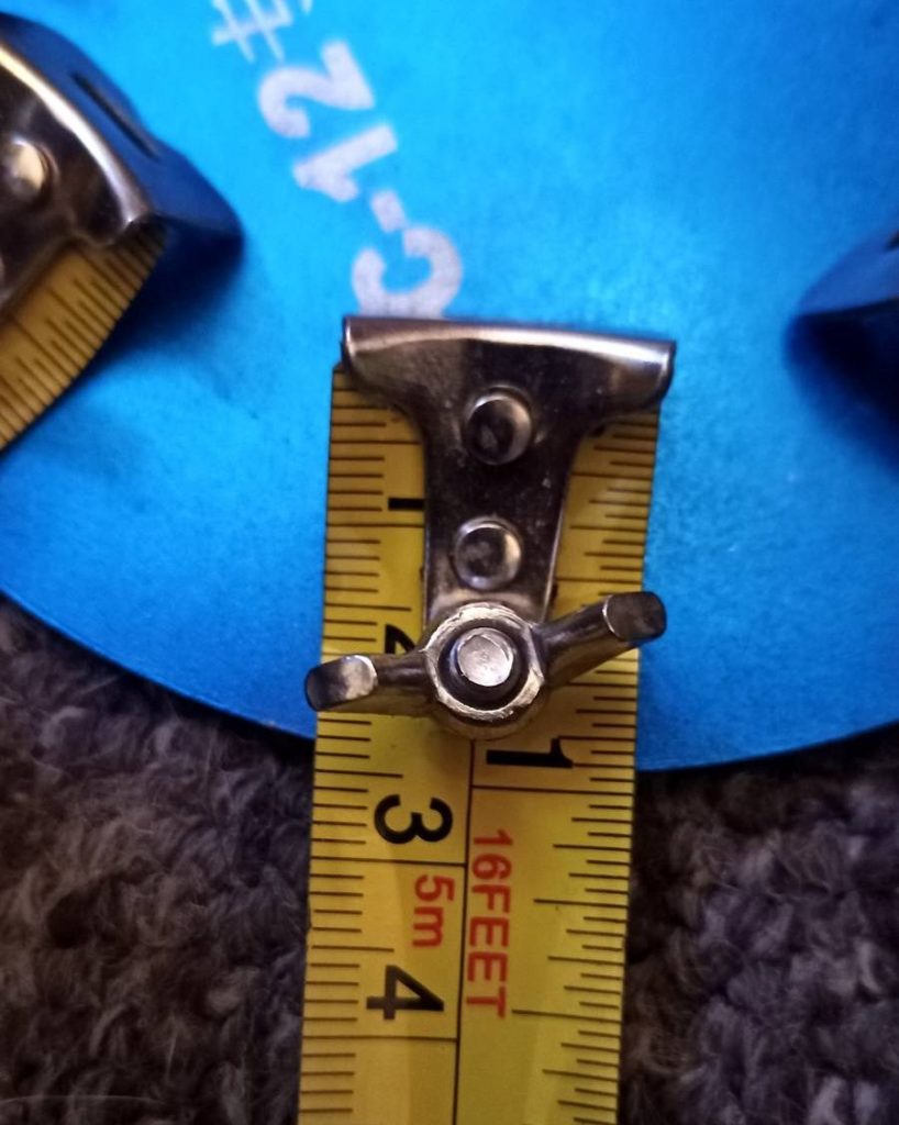 Tape measure radial fixing